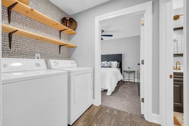 laundry room featuring sink and washing machine and clothes dryer