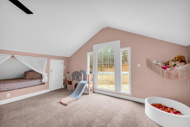 game room featuring lofted ceiling and carpet floors