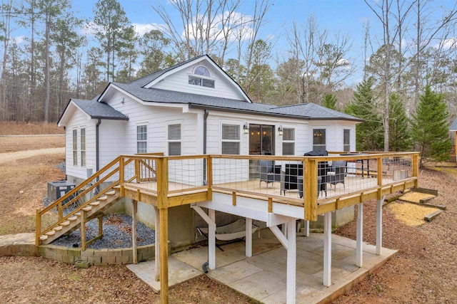 rear view of house with a patio area and a deck