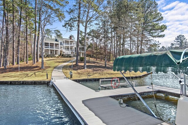 dock area with a water view