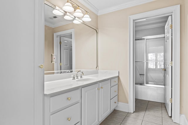 full bath featuring enclosed tub / shower combo, tile patterned flooring, vanity, visible vents, and ornamental molding