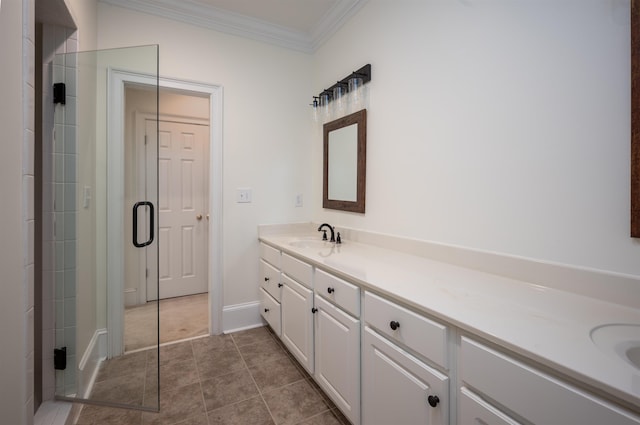 bathroom with crown molding, vanity, tile patterned floors, and a shower with shower door