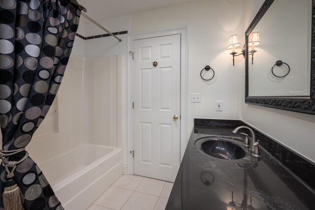 bathroom featuring vanity, tile patterned flooring, and shower / bath combo with shower curtain