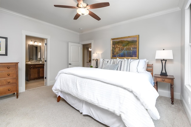 bedroom featuring crown molding, light colored carpet, ceiling fan, and ensuite bathroom