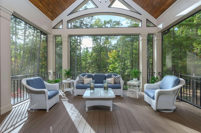 sunroom with wood ceiling and vaulted ceiling