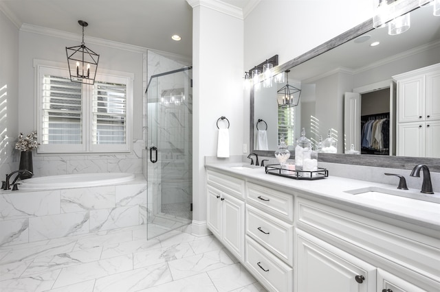 bathroom with plus walk in shower, plenty of natural light, ornamental molding, and vanity