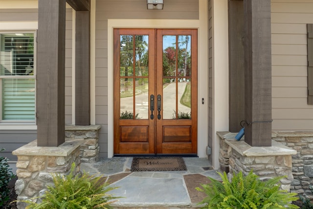 entrance to property featuring french doors