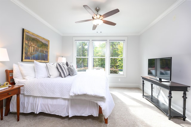 bedroom with light carpet, ornamental molding, and ceiling fan