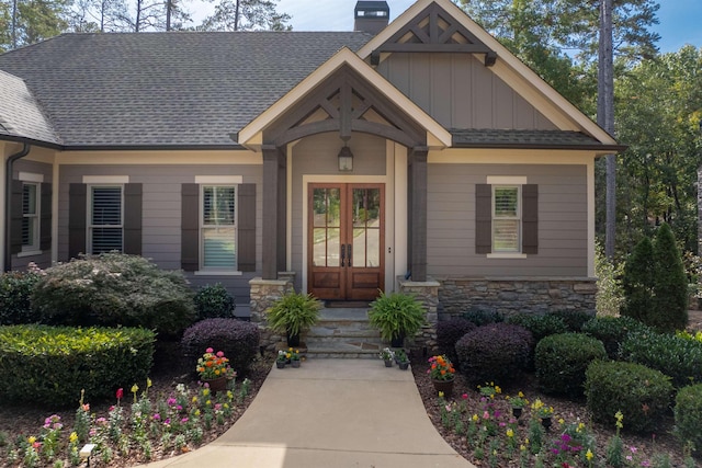 property entrance featuring french doors