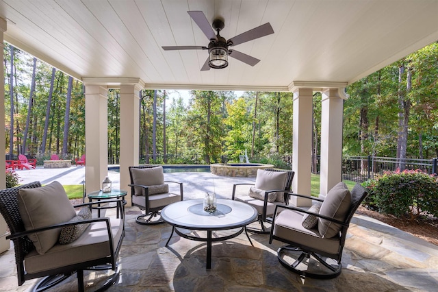 view of patio / terrace featuring an outdoor living space and ceiling fan