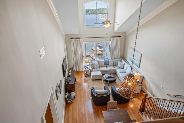 120UNIT304 Indian Summer Path, Eatonton, GA 31024 - living room featuring hardwood / wood-style floors, a towering ceiling, ornamental molding, and ceiling fan