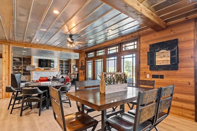 182 Corral Rd, Milledgeville, GA 31061 - dining space with wooden walls, light wood-type flooring, a ceiling fan, recessed lighting, and beamed ceiling