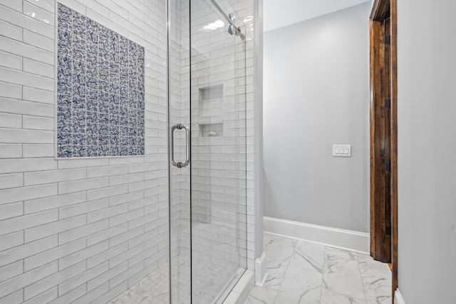 182 Corral Rd, Milledgeville, GA 31061 - full bath featuring marble look tiles, a stall shower, and baseboards