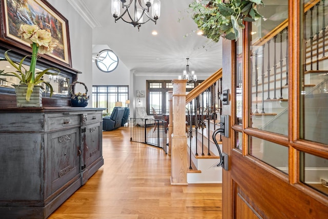 182 Corral Rd, Milledgeville, GA 31061 - entrance foyer featuring a chandelier, stairway, crown molding, light wood-style flooring, and recessed lighting