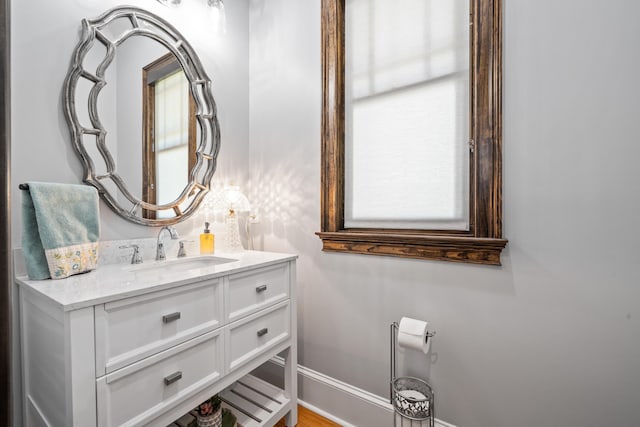 182 Corral Rd, Milledgeville, GA 31061 - bathroom featuring baseboards and vanity