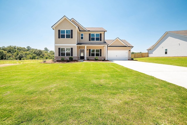 craftsman inspired home with a garage, a front lawn, and covered porch