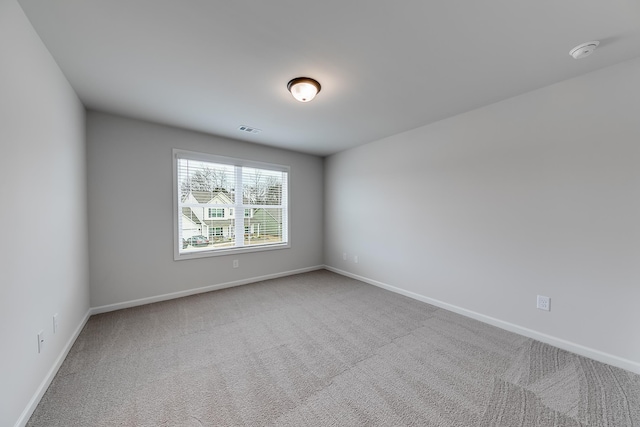 empty room featuring carpet flooring