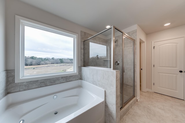 bathroom featuring plus walk in shower