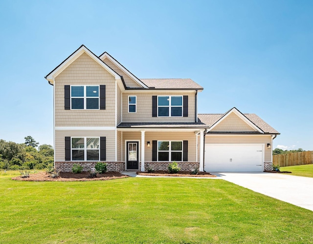 craftsman-style home with a garage and a front lawn