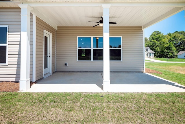 view of patio featuring ceiling fan