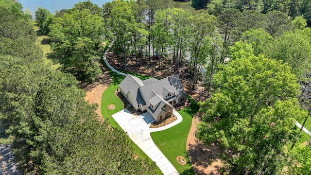 view from above of property featuring a forest