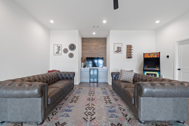 living area featuring visible vents, wood finished floors, and recessed lighting