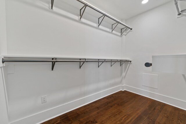 136 Hidden Lake Dr, Eatonton, GA 31024 - walk in closet featuring dark wood-style floors
