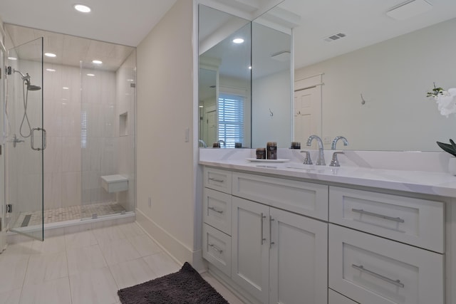 136 Hidden Lake Dr, Eatonton, GA 31024 - full bathroom with a stall shower, recessed lighting, visible vents, and vanity