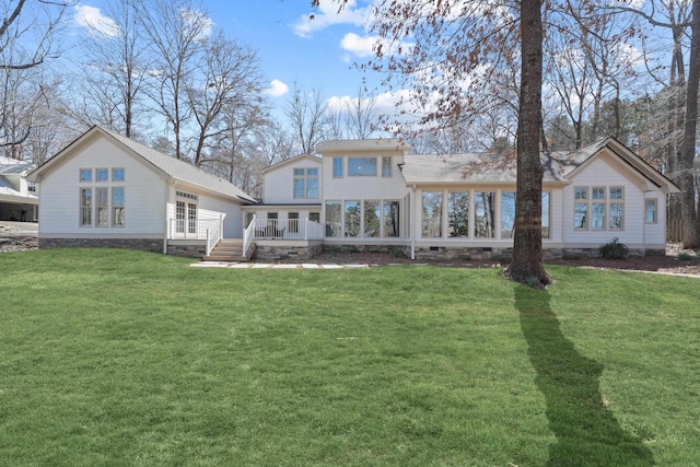 136 Hidden Lake Dr, Eatonton, GA 31024 - back of property featuring crawl space, a lawn, and a deck