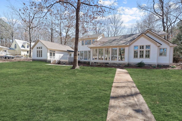 136 Hidden Lake Dr, Eatonton, GA 31024 - view of front of property with a front lawn, crawl space, and a sunroom