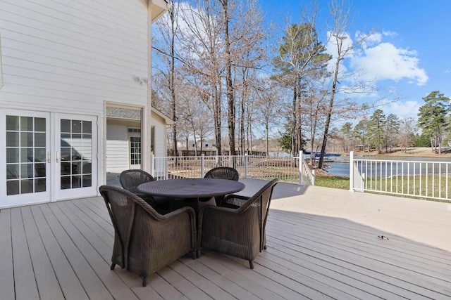 136 Hidden Lake Dr, Eatonton, GA 31024 - wooden terrace featuring french doors and outdoor dining space
