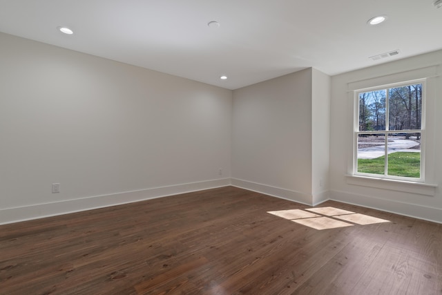 136 Hidden Lake Dr, Eatonton, GA 31024 - empty room with dark wood-style floors, recessed lighting, and baseboards