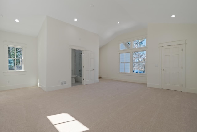 136 Hidden Lake Dr, Eatonton, GA 31024 - unfurnished bedroom with light carpet, vaulted ceiling, and recessed lighting