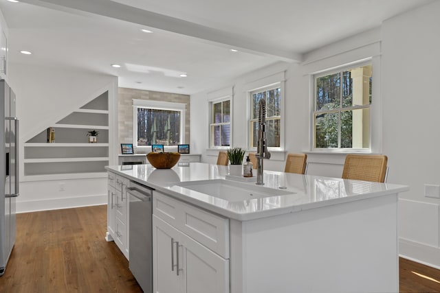 136 Hidden Lake Dr, Eatonton, GA 31024 - kitchen featuring white cabinets, dishwasher, an island with sink, dark wood-style flooring, and recessed lighting