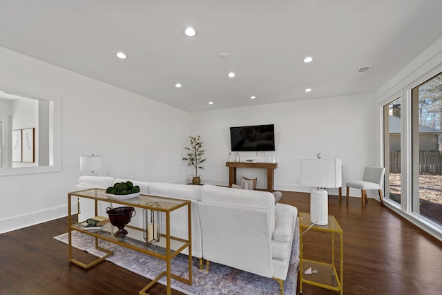 136 Hidden Lake Dr, Eatonton, GA 31024 - living room featuring baseboards, wood finished floors, visible vents, and recessed lighting
