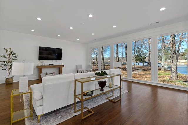 136 Hidden Lake Dr, Eatonton, GA 31024 - living area with wood finished floors, visible vents, and recessed lighting