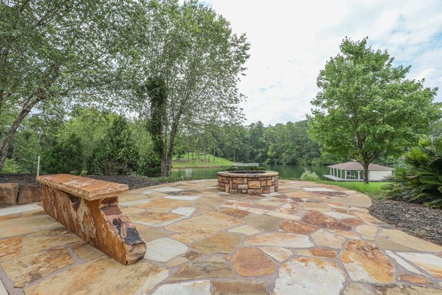 256 Jule Ingram Rd, Milledgeville, GA 31061 - view of patio with a water view