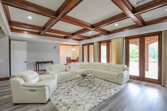 living room featuring beamed ceiling, wood-type flooring, coffered ceiling, and french doors