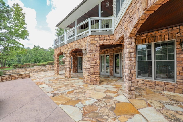 view of patio with a balcony