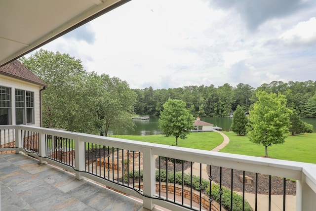 balcony featuring a water view