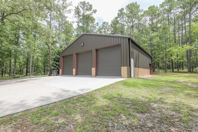 garage with a lawn