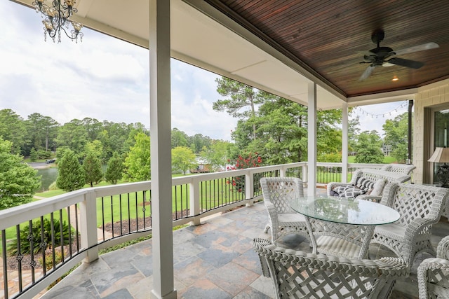 view of patio featuring ceiling fan