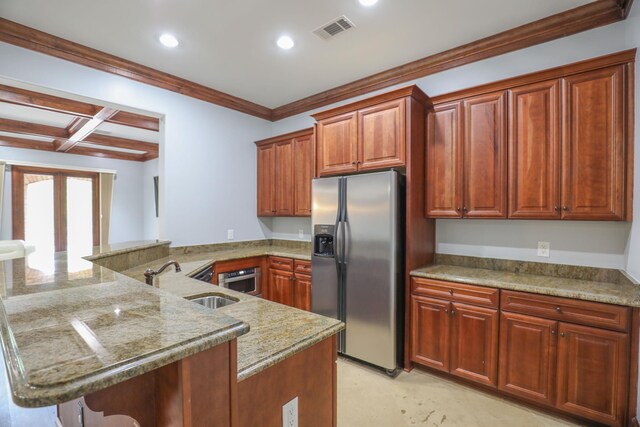 256 Jule Ingram Rd, Milledgeville, GA 31061 - kitchen featuring sink, a kitchen breakfast bar, coffered ceiling, kitchen peninsula, and stainless steel appliances