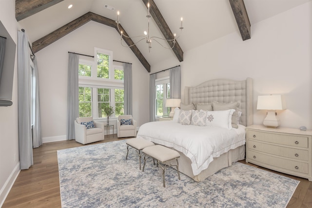 1070 Griffin Crk, Greensboro, GA 30642 - bedroom with a chandelier, beam ceiling, wood finished floors, high vaulted ceiling, and recessed lighting