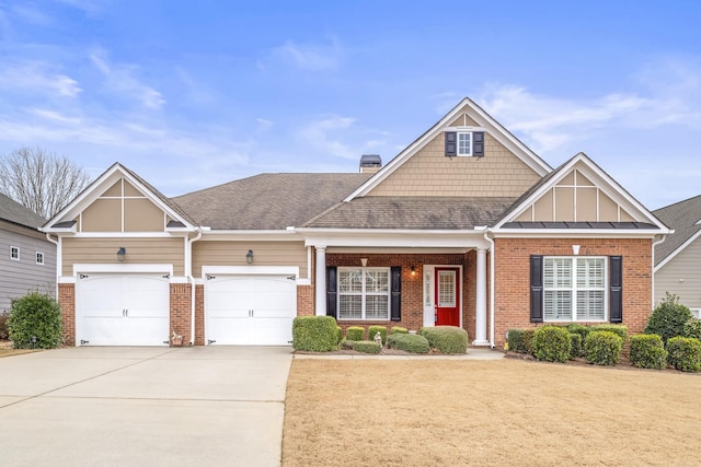 craftsman-style home with a garage