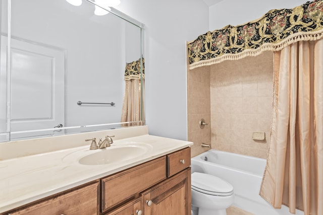 full bathroom featuring vanity, toilet, and shower / bath combo with shower curtain