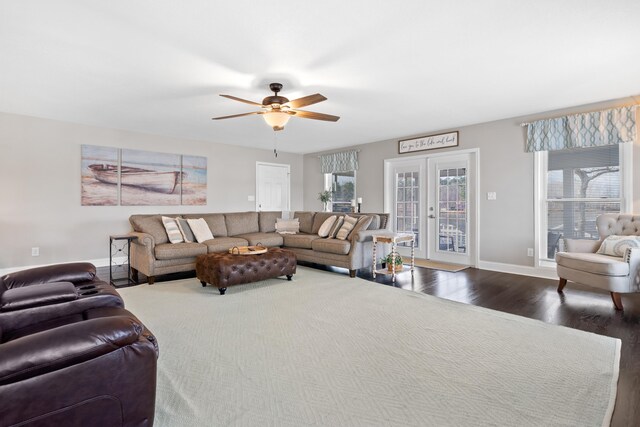 408 Sheffield Ln, Sparta, GA 31087 - living room with ceiling fan, baseboards, and dark wood finished floors