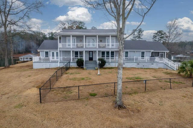 408 Sheffield Ln, Sparta, GA 31087 - view of front of home featuring a front lawn, covered porch, and metal roof
