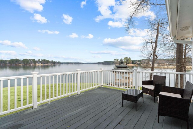 408 Sheffield Ln, Sparta, GA 31087 - wooden deck with a water view