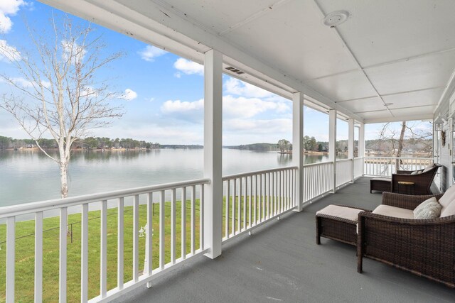 408 Sheffield Ln, Sparta, GA 31087 - unfurnished sunroom featuring a water view